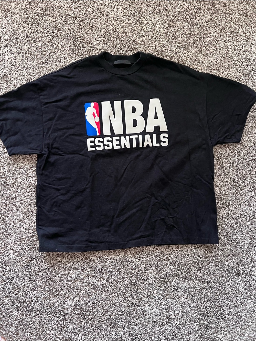 Essentials NBA Black Graphic Tee with White Logo and Red/Blue Accent
